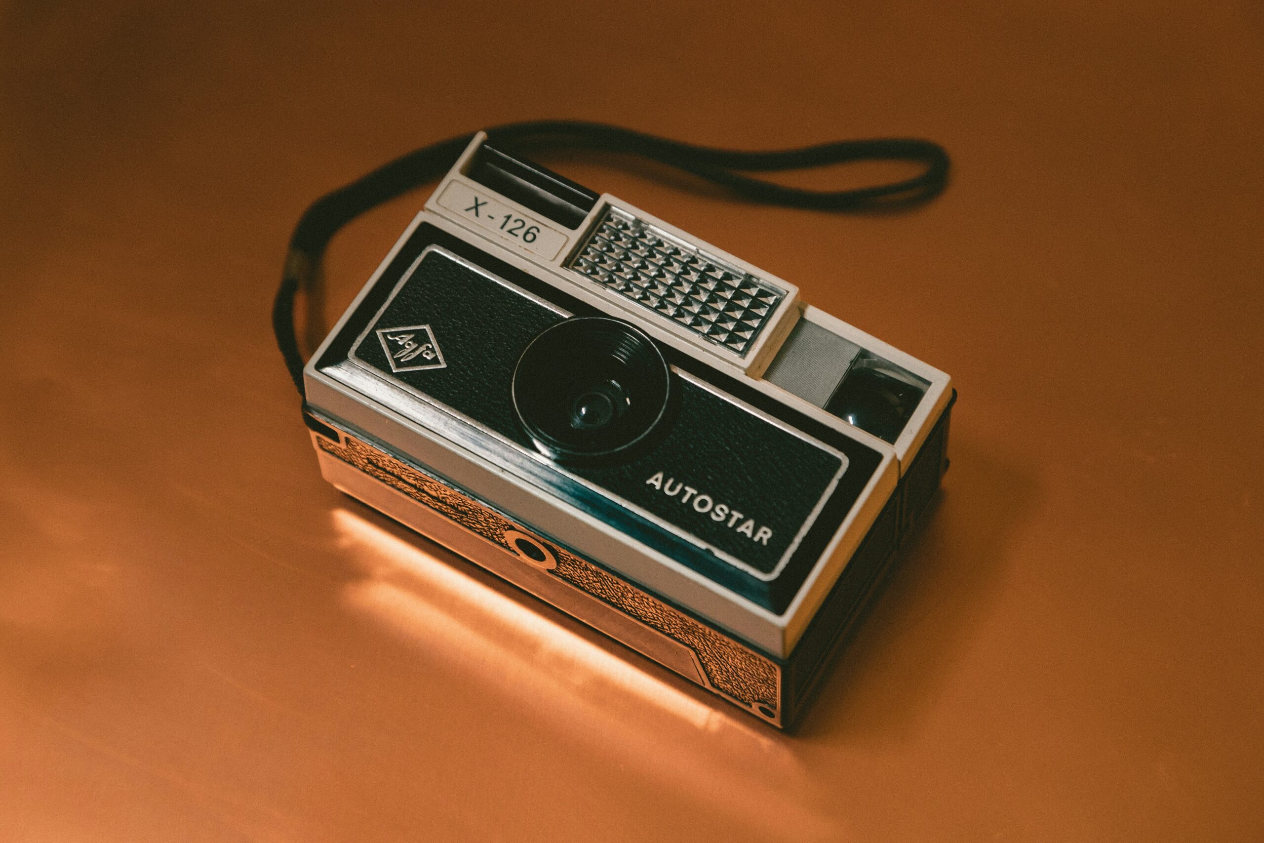 A vintage Casio calculator watch next to modern coding smartwatch