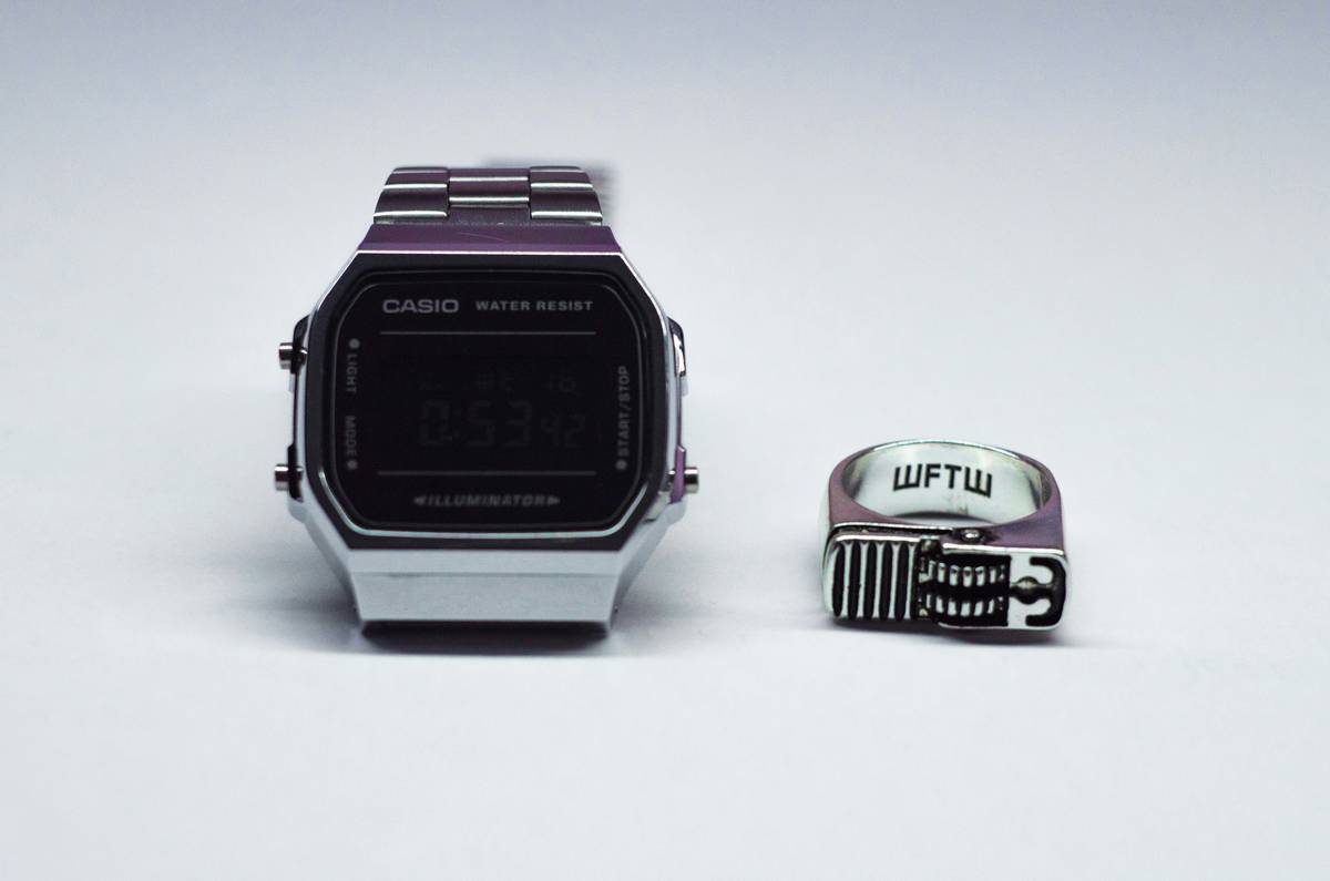 Photo of a professional wearing a Casio Databank non programmable watch on a construction site