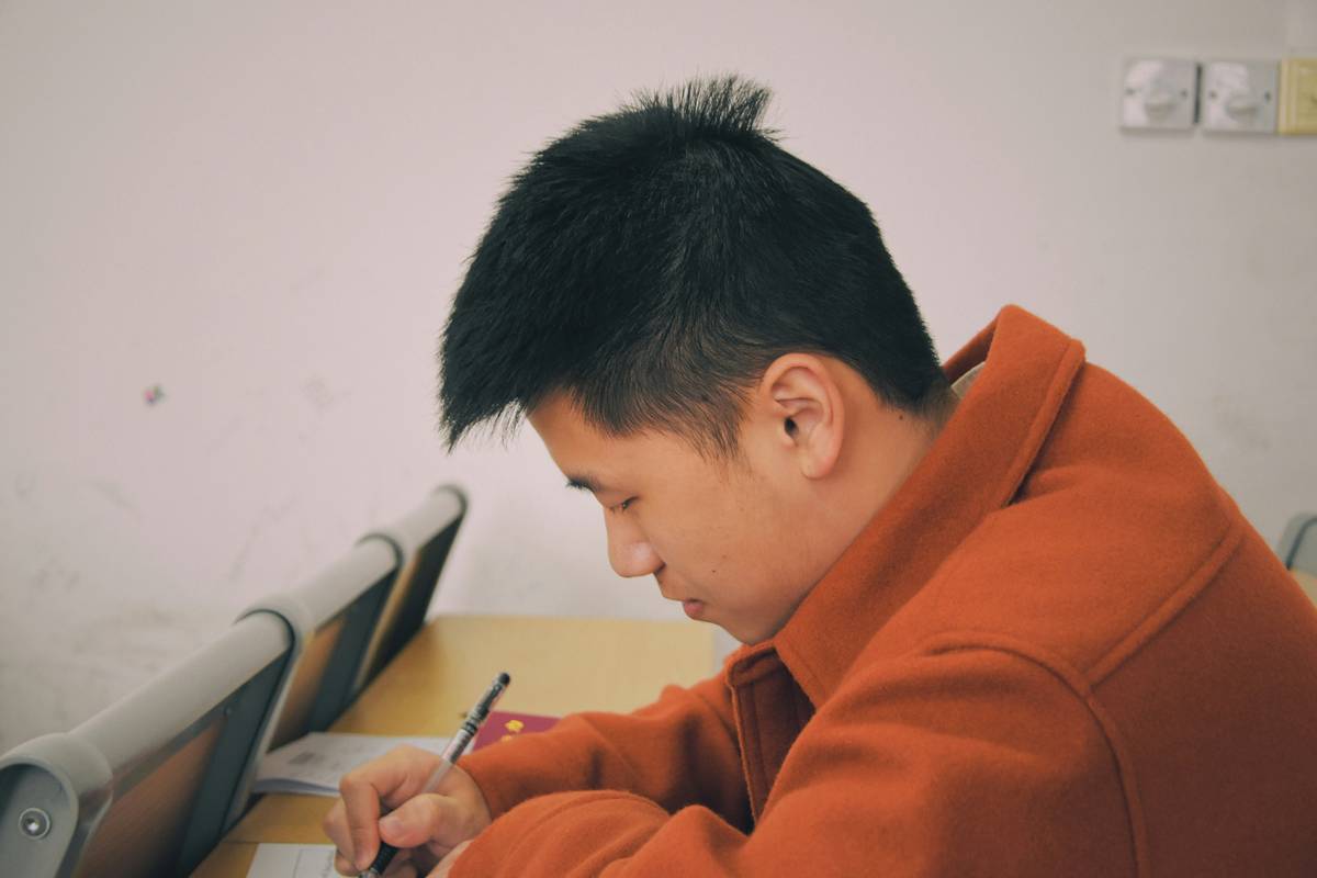 Illustration of a student concentrating while wearing a watch calculator in exam mode