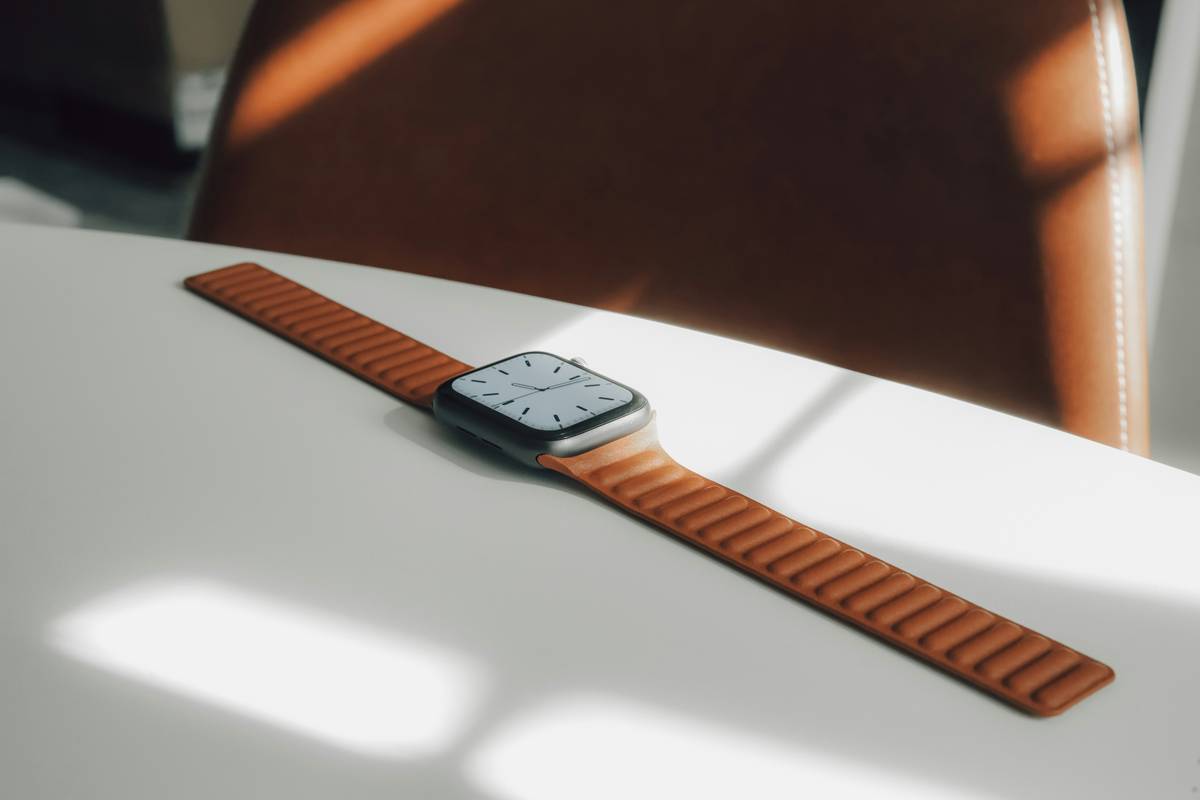 A vintage Casio calculator watch compared to a sleek modern design