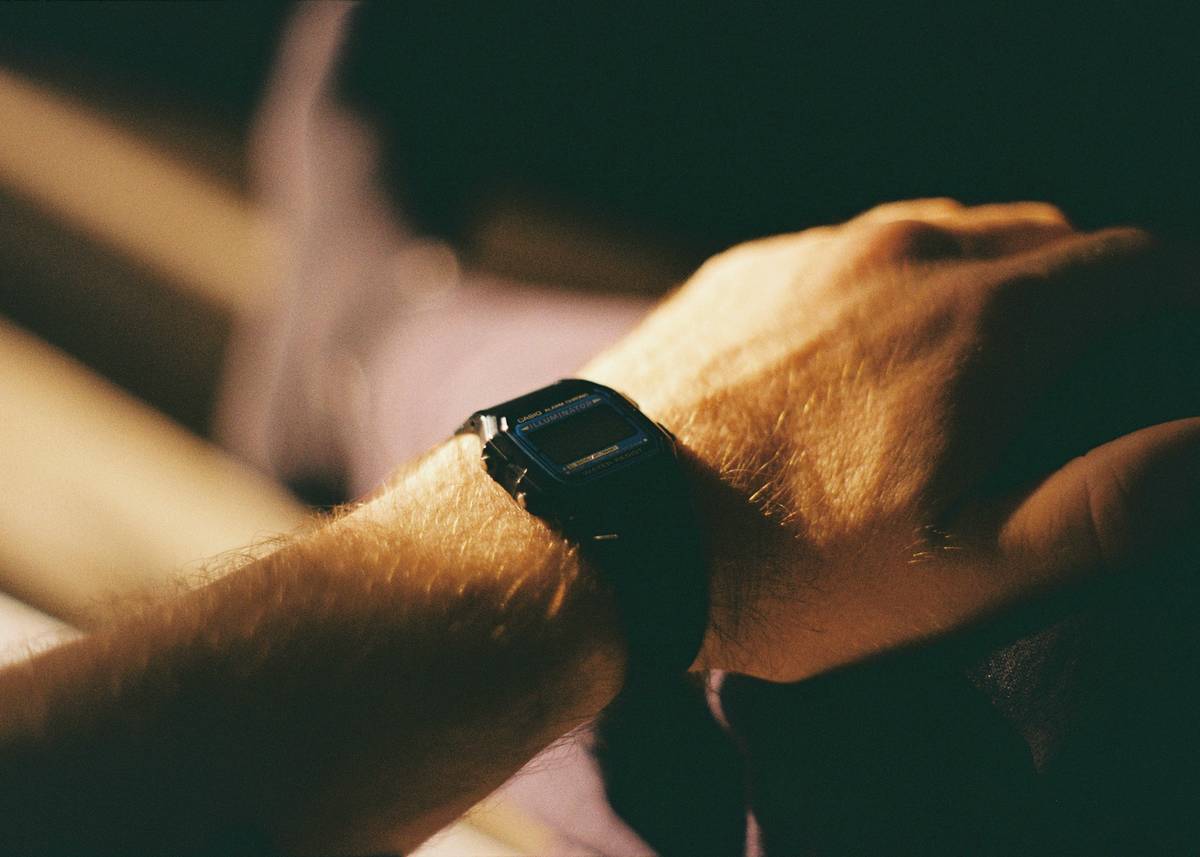 A sleek modern watch calculator designed for exams