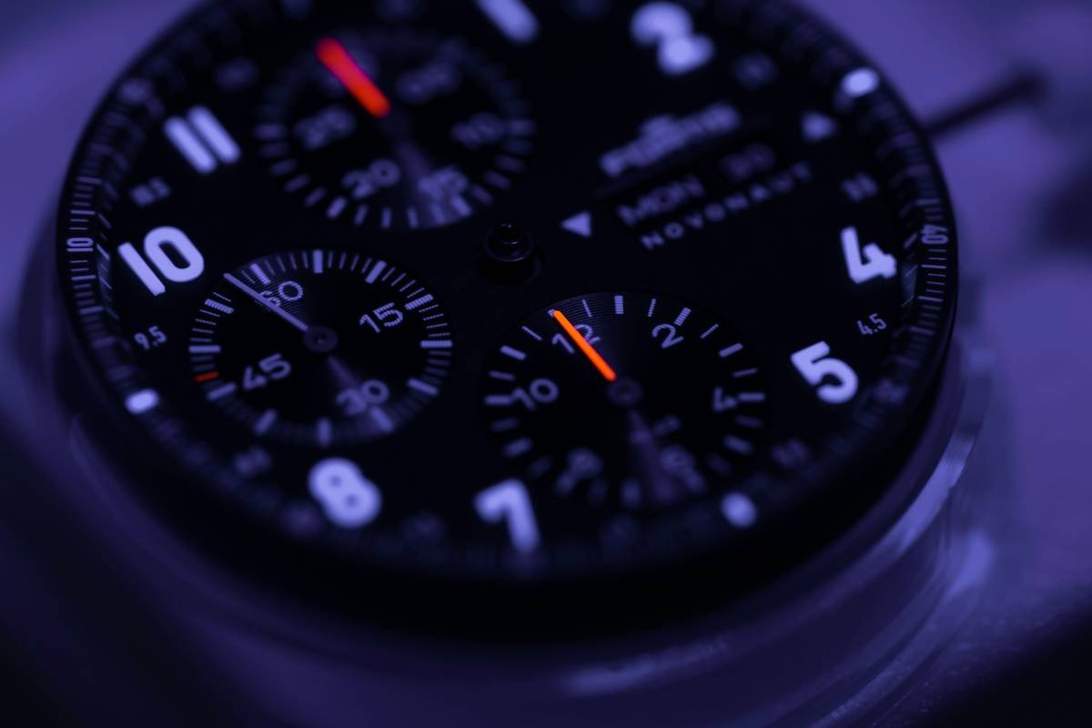 Diagram showing Casio G-Shock GW-M5610U with labeled stem, buttons, and calculator interface indicating scientific functions like sin, log, and integral symbols