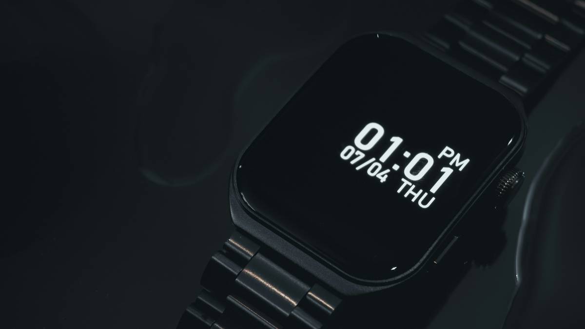 Timeline infographic showing evolution of report calc watches from 1983 Casio Databank to 2023 Citizen Promaster Eco-Drive BN0150-28E with solar-powered calculator functions