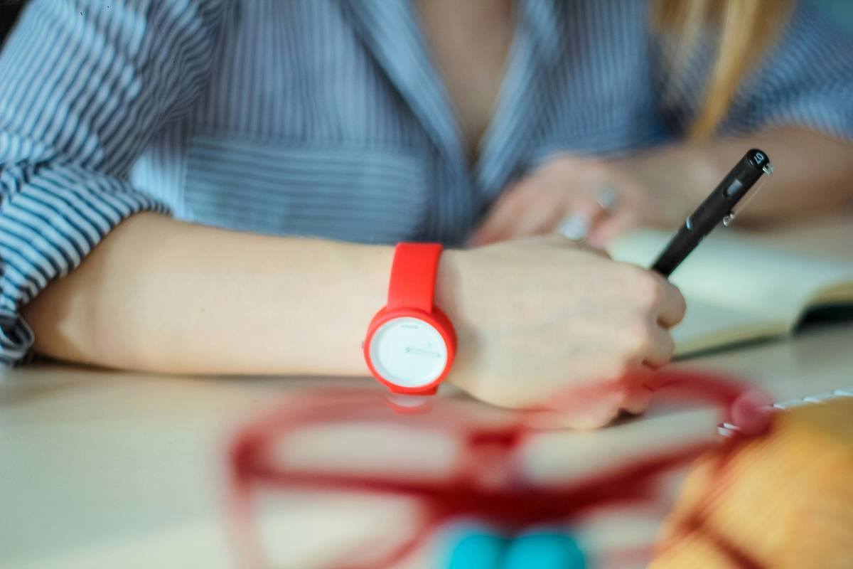Student using a study tool watch during timed calculus exam