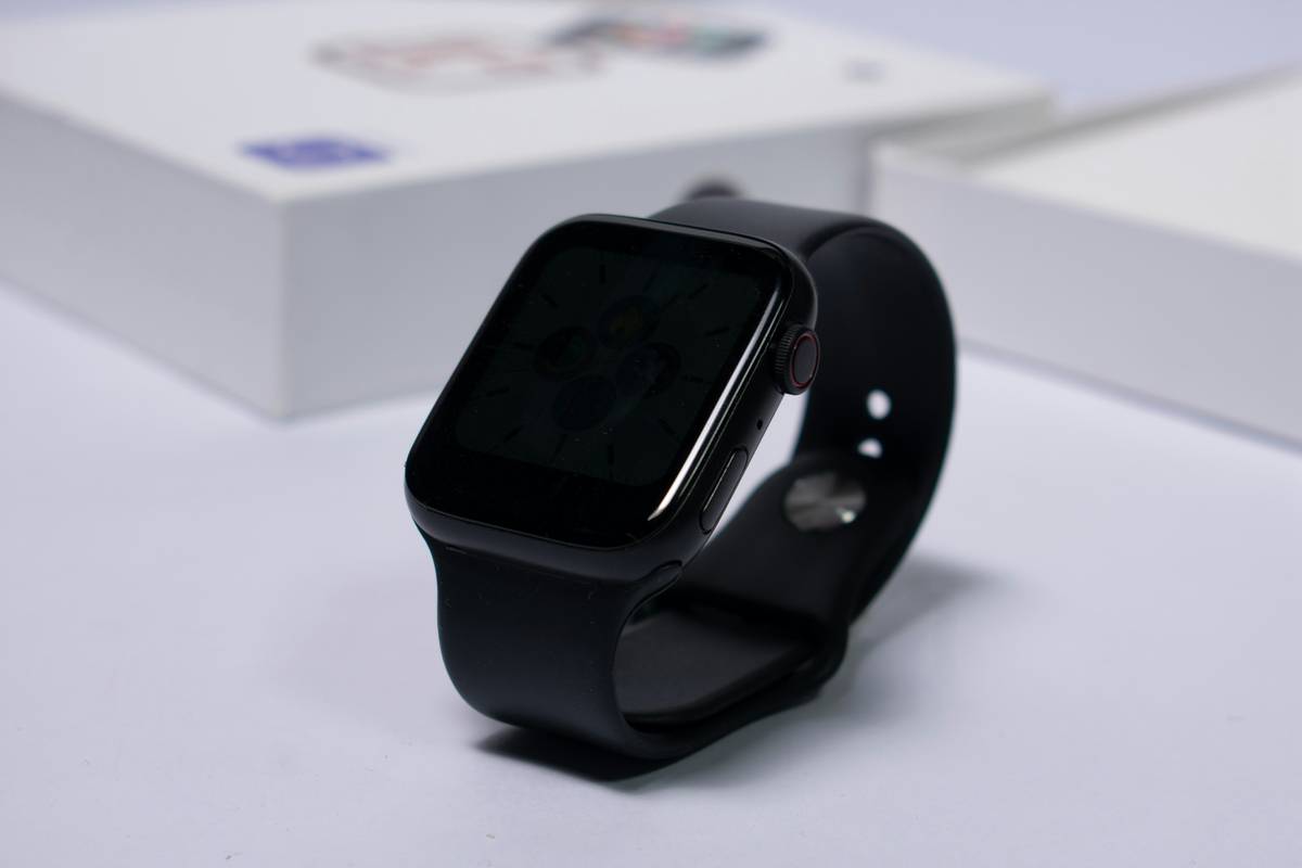 smart watch with calculator showing tip calculation on color touchscreen